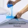 Our-Decembery-waterproof-fitted-sheet-and-bed-protector-sheet-offer-maximum-defense-against-spills-and-accidents-making-them-perfect-for-both-adults-and-children.